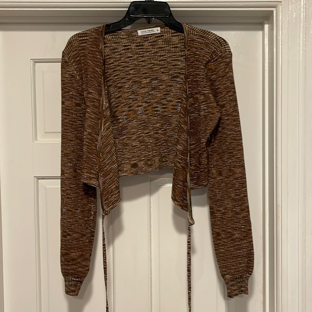 Cropped cross sweater